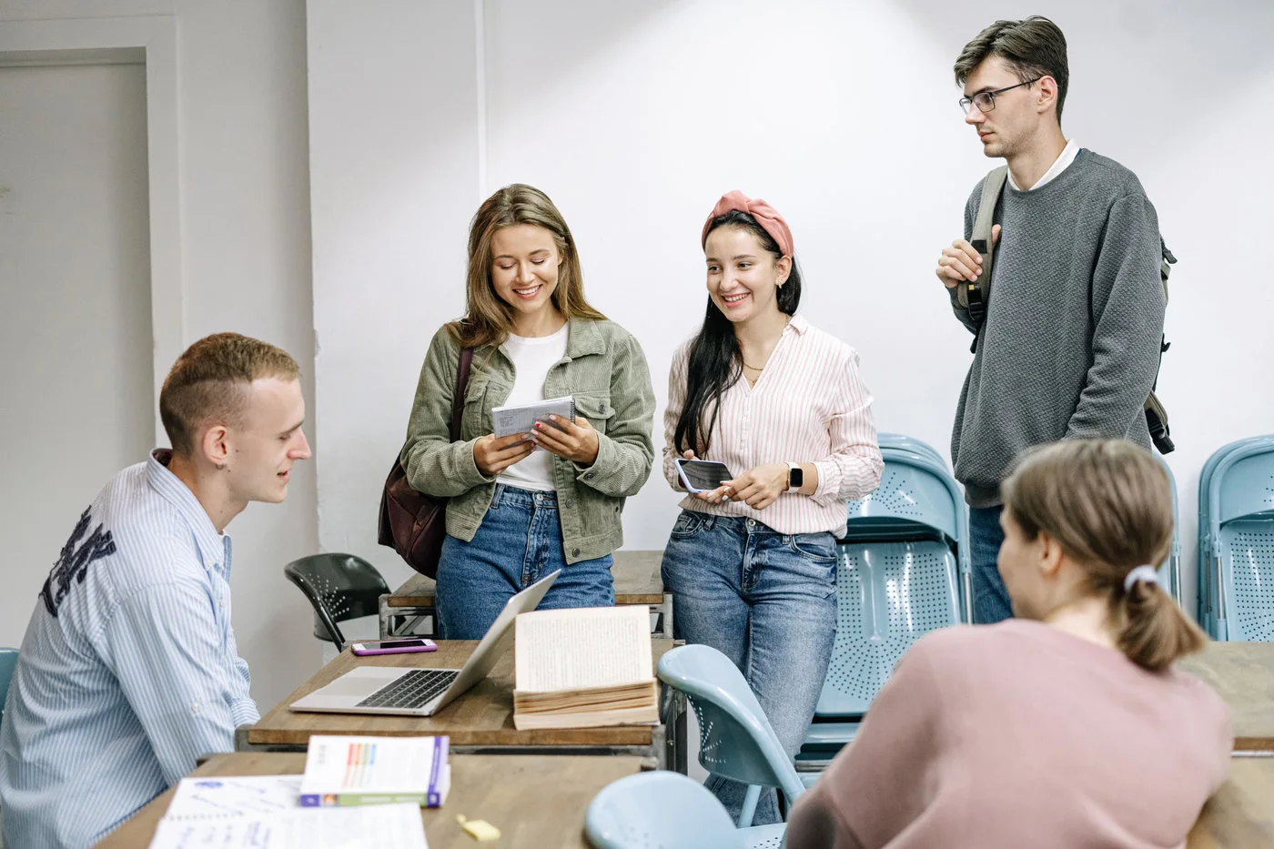Diverse students discussing ideas during a collaborative learning session