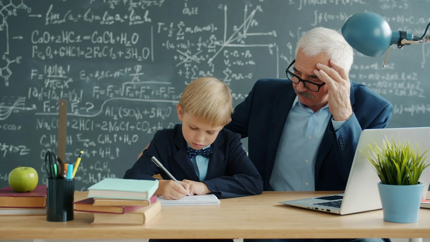 Student carefully checking information while studying with a laptop